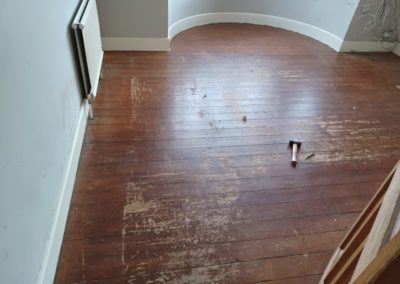 Before Pine Floorboard Restoration in Cheam, Surrey