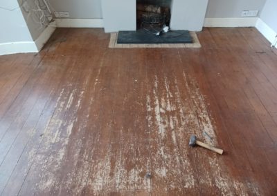 Before Pine Floorboard Restoration in Cheam, Surrey