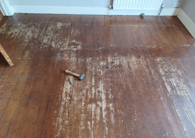 Before Pine Floorboard Restoration in Cheam, Surrey