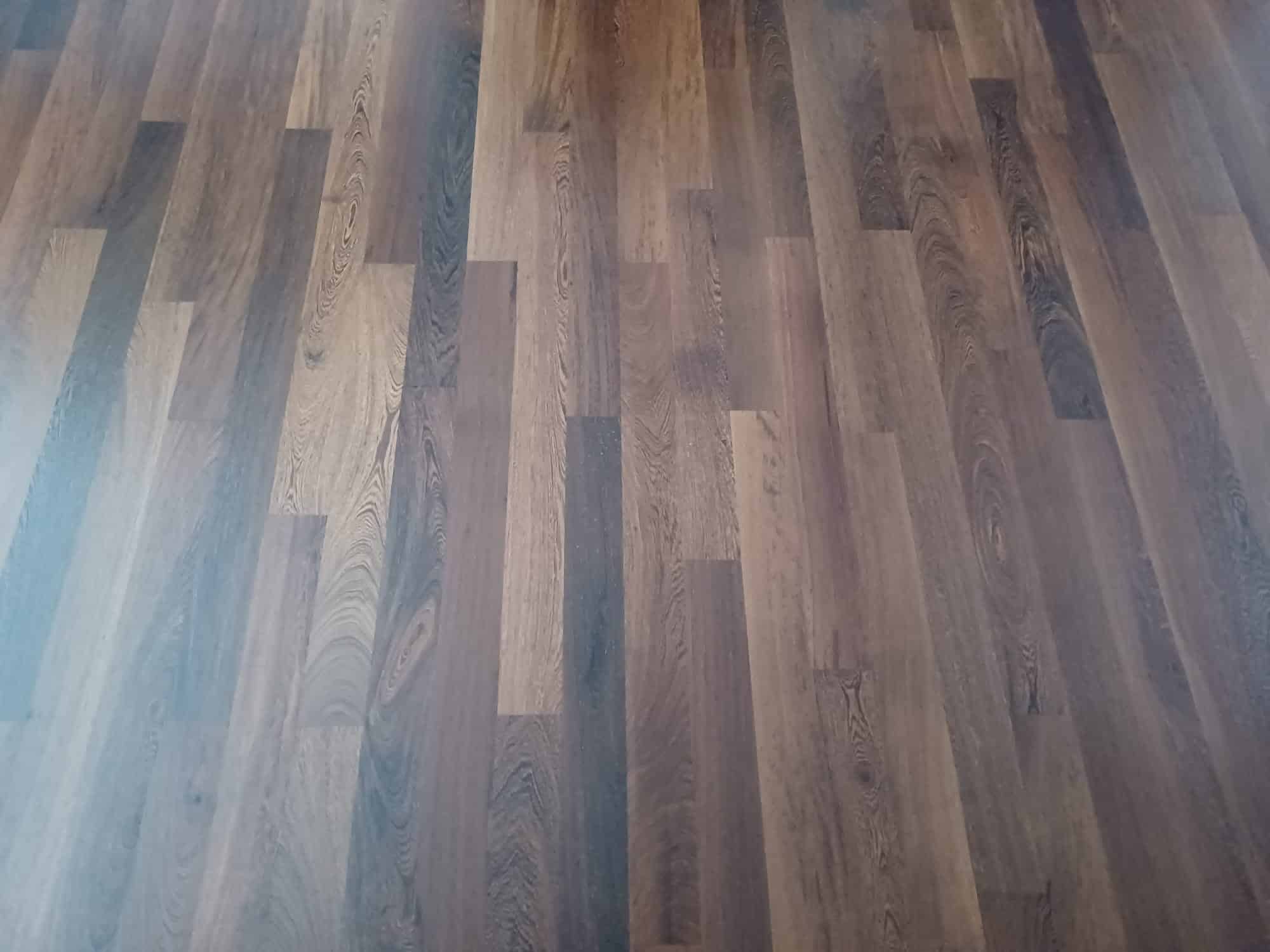 Dark timber floor restoration in Caterham